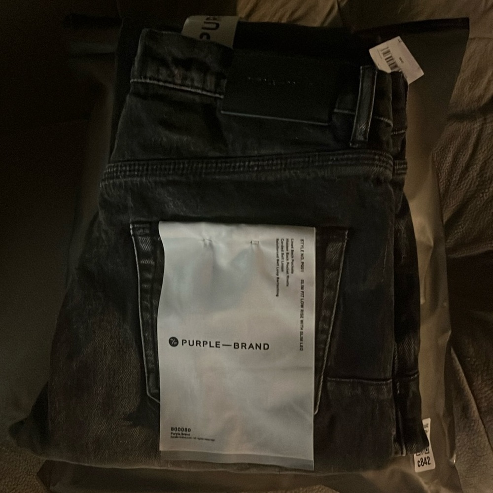 Purple jeans size 30 in mens brand new colors are black and grey never worn.